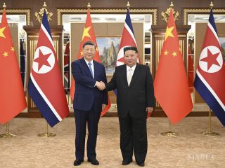 ရှီကျင့်ဖိန်နှင့် ကင်ဂျုံအန်း တွေ့ဆုံဆွေးနွေး