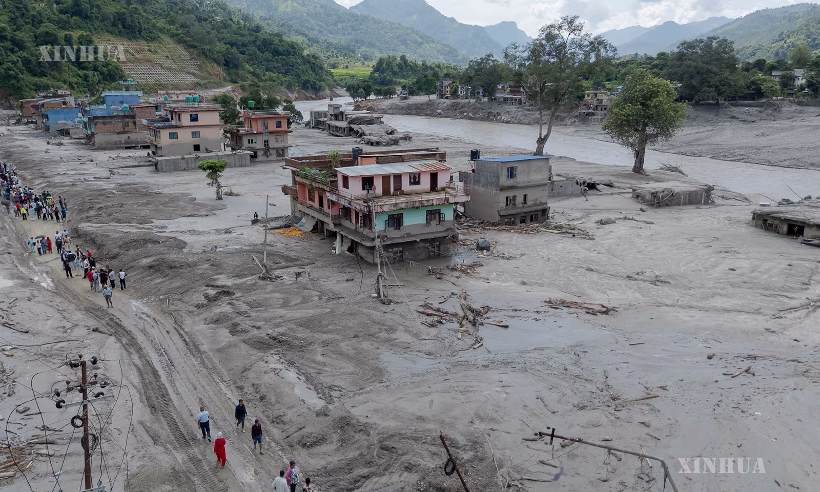 နီပေါနိုင်ငံ Nuwakot ခရိုင်တွင် ရေကြီးရေလျှံမှု ဖြစ်ပွားသောနေရာကို ဝေဟင်မြင်ကွင်းမှတစ်ဆင့် ၂၀၂၆ ခုနှစ် ဩဂုတ် ၂၇ ရက်က တွေ့ရစဉ် (ဆင်ဟွာ)