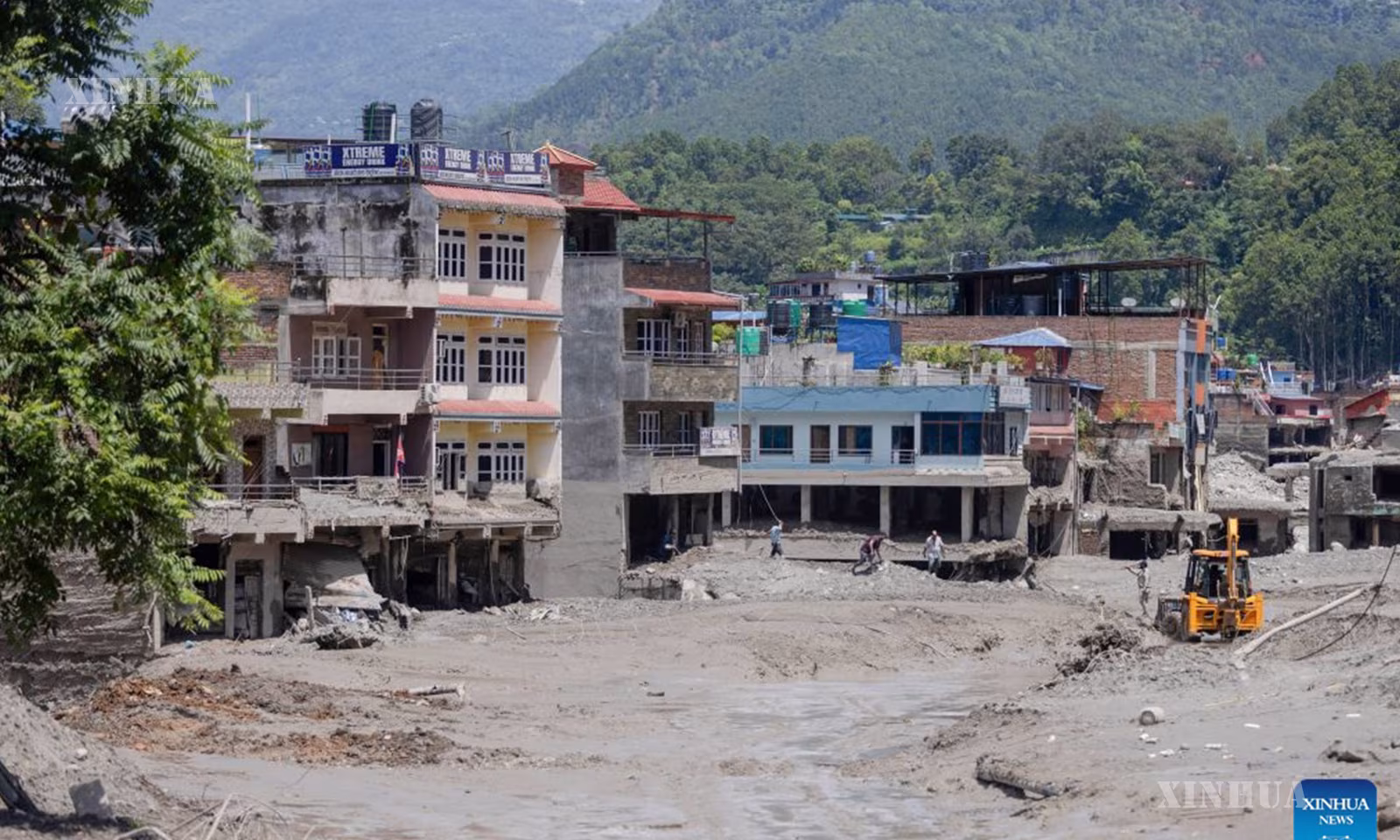 နီပေါနိုင်ငံ Nuwakot ဒေသတွင် ပြင်းထန်သော ရေကြီးရေလျှံမှု ရုက်တရက်ဖြစ်ပွားပြီးနောက် မြင်ကွင်းတစ်ခုကို ၂၀၂၆ ခုနှစ် ဩဂုတ် ၂၇ ရက်က တွေ့ရစဉ် (ဆင်ဟွာ)